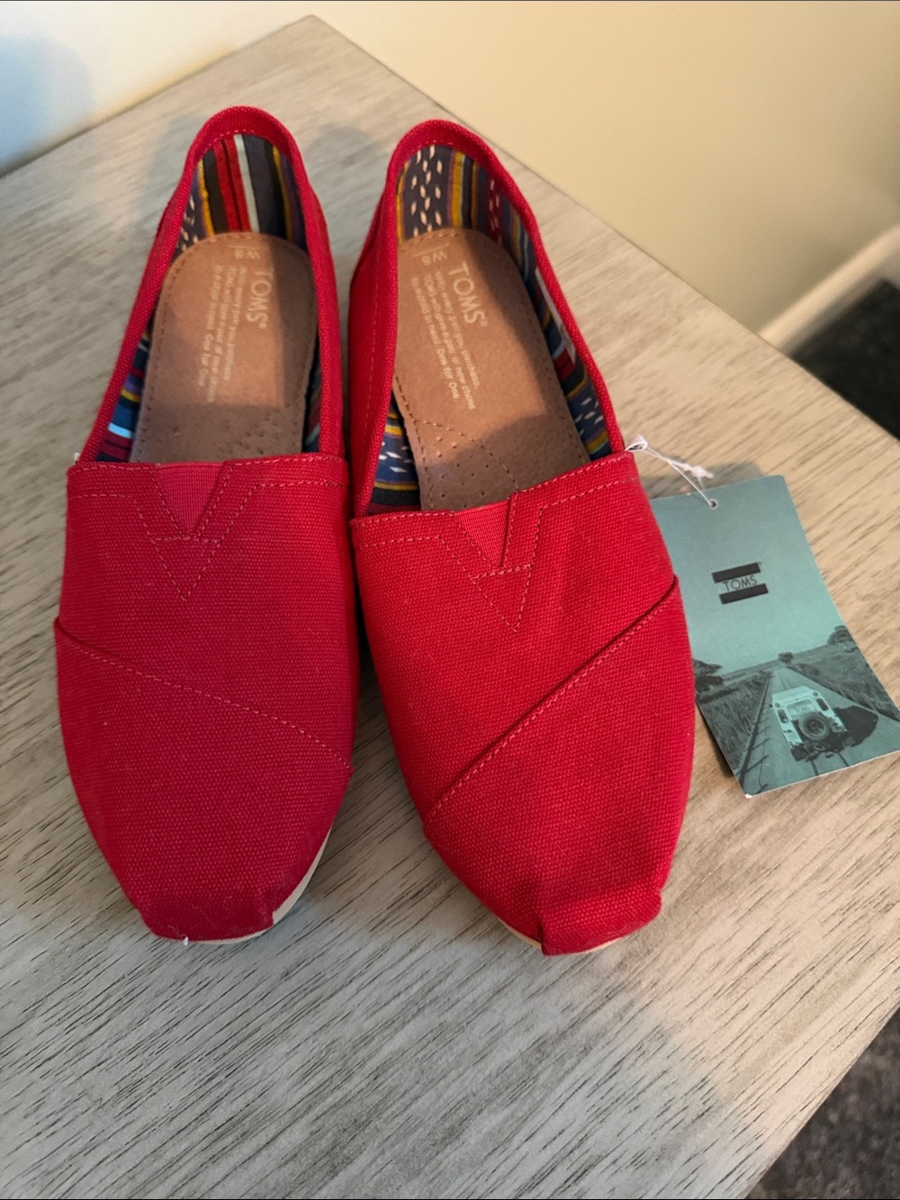 Women's red slip-on canvas shoes